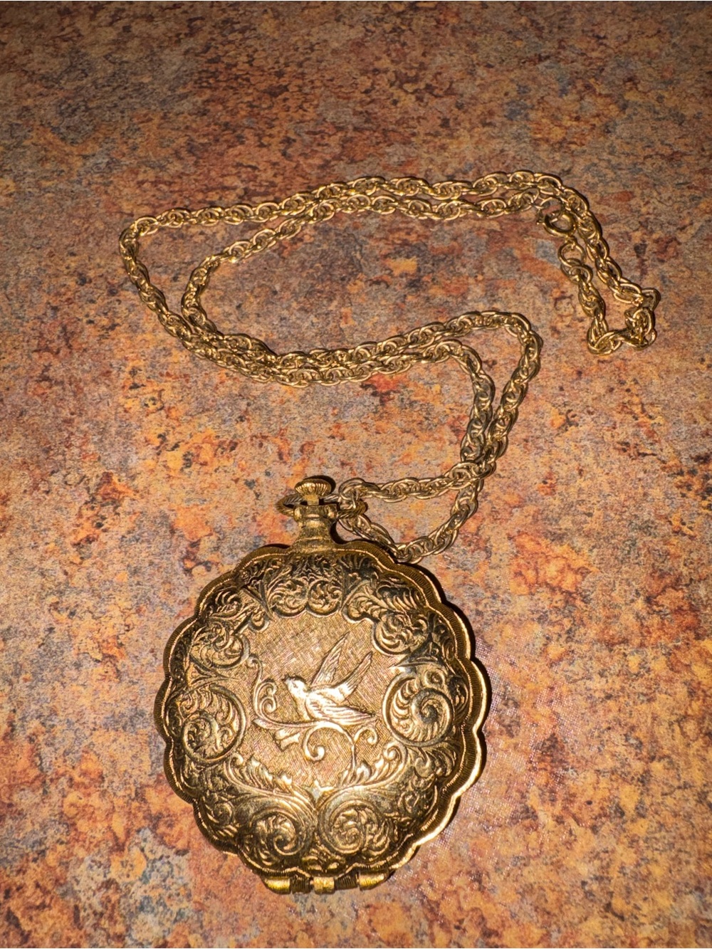 Ornate Gold Tone Bird Locket Necklace